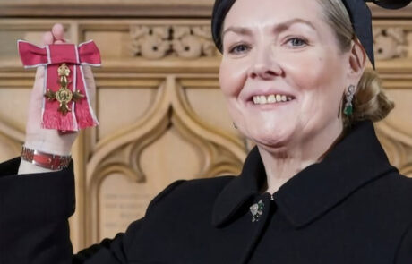 Jacqueline O'Donovan with an OBE award